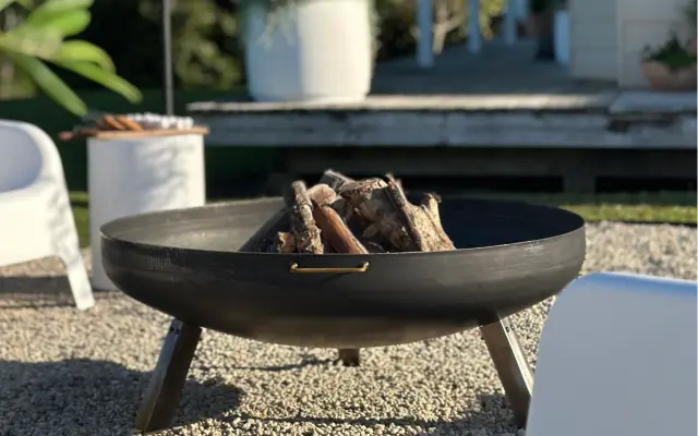 Fire bowl on a gravel courtyard