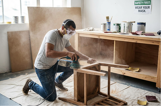 sanding with a dust mask