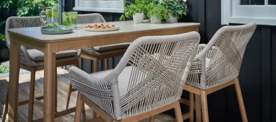 Compact outdoor dining setting on a deck