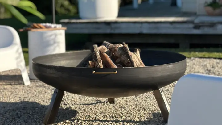Outdoor heater beside a seating area