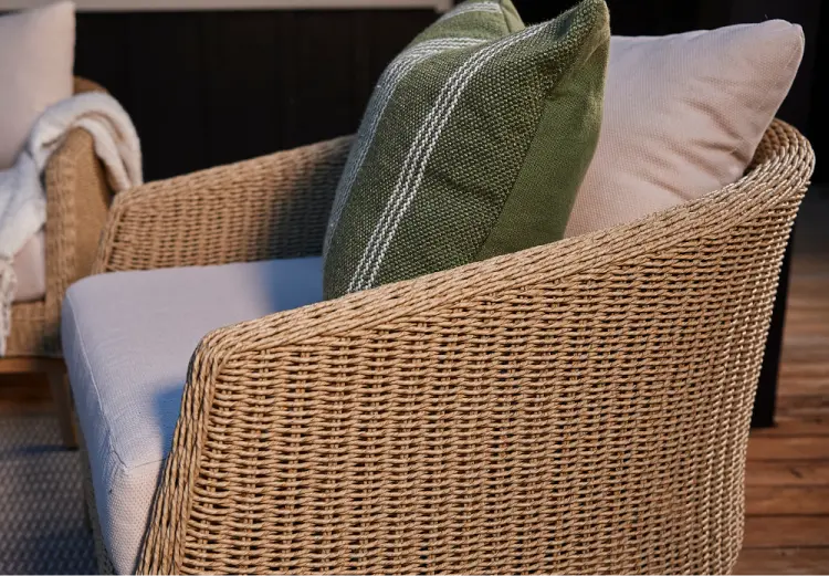 Deep outdoor lounge seating with soft cushions