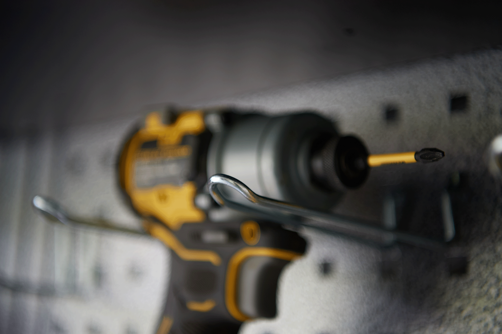 Power tool mounted on pegboard