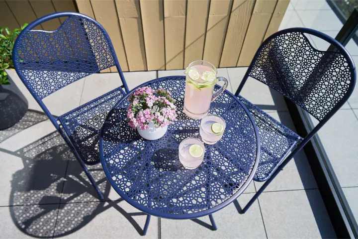 Balcony styled with seating and plants