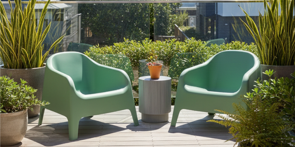 Balcony side table with greenery and a city outlook